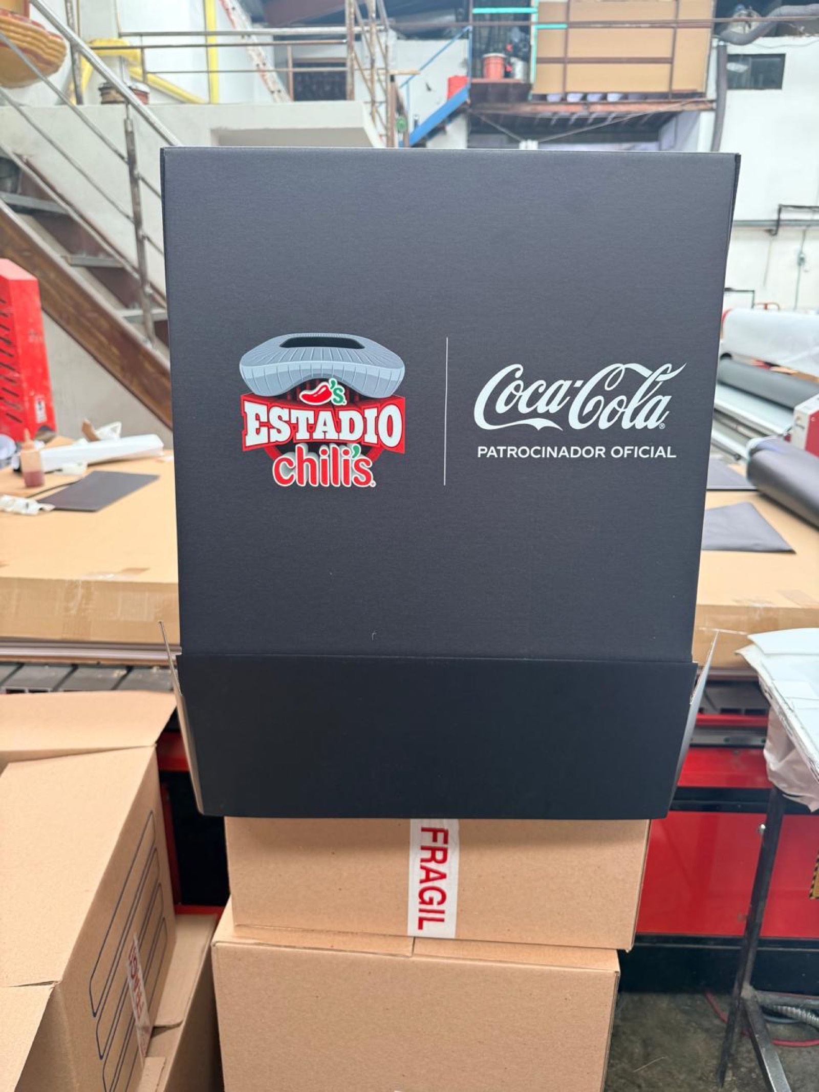 Caja Coca-Cola Chili's en producción